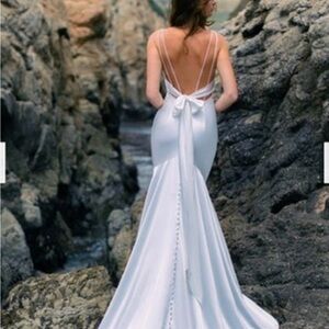 White Sleeveless Plunge Neck Bridal Gown